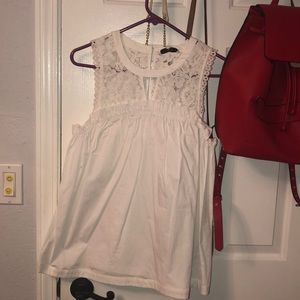 A white lace shirt , goes great with jeans .